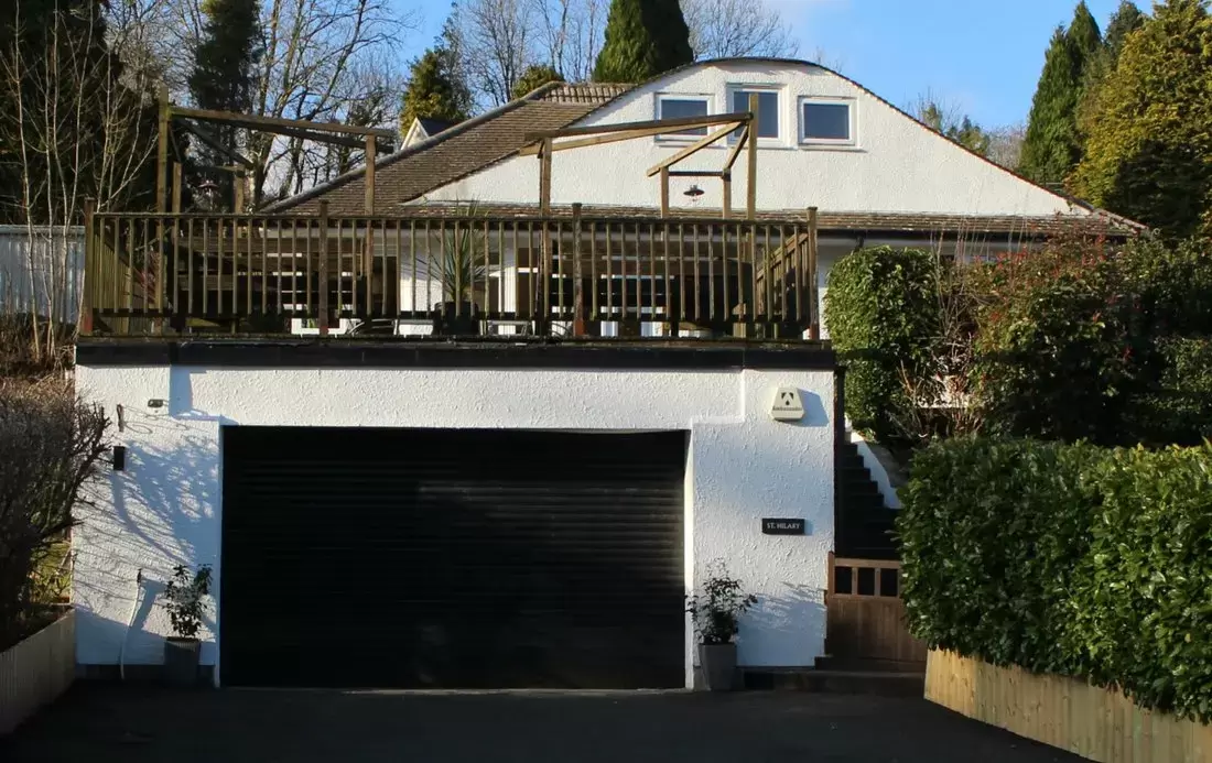 Double Garage with Remote controlled electric roller shutter door 