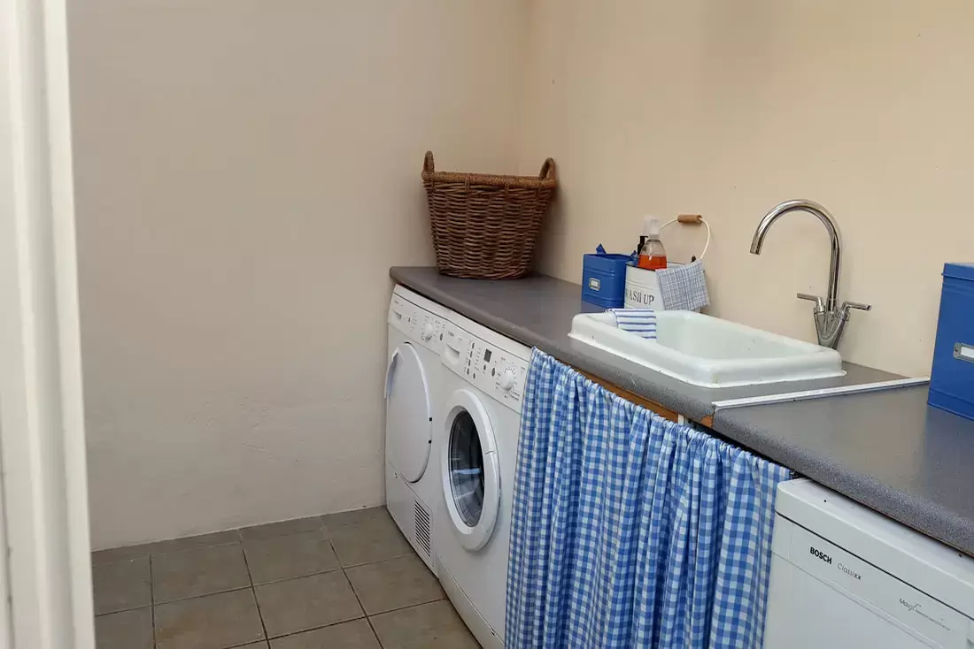 Space for washing machine, tumble dryer & under-counter freezer. 
